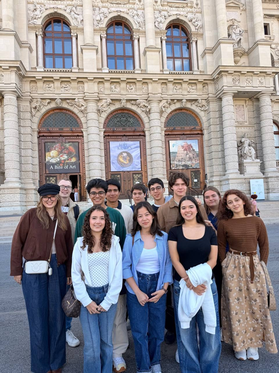 Our Schloss Krumbach International School students explore a museum gallery surrounded by Egyptian coffins and painted walls.