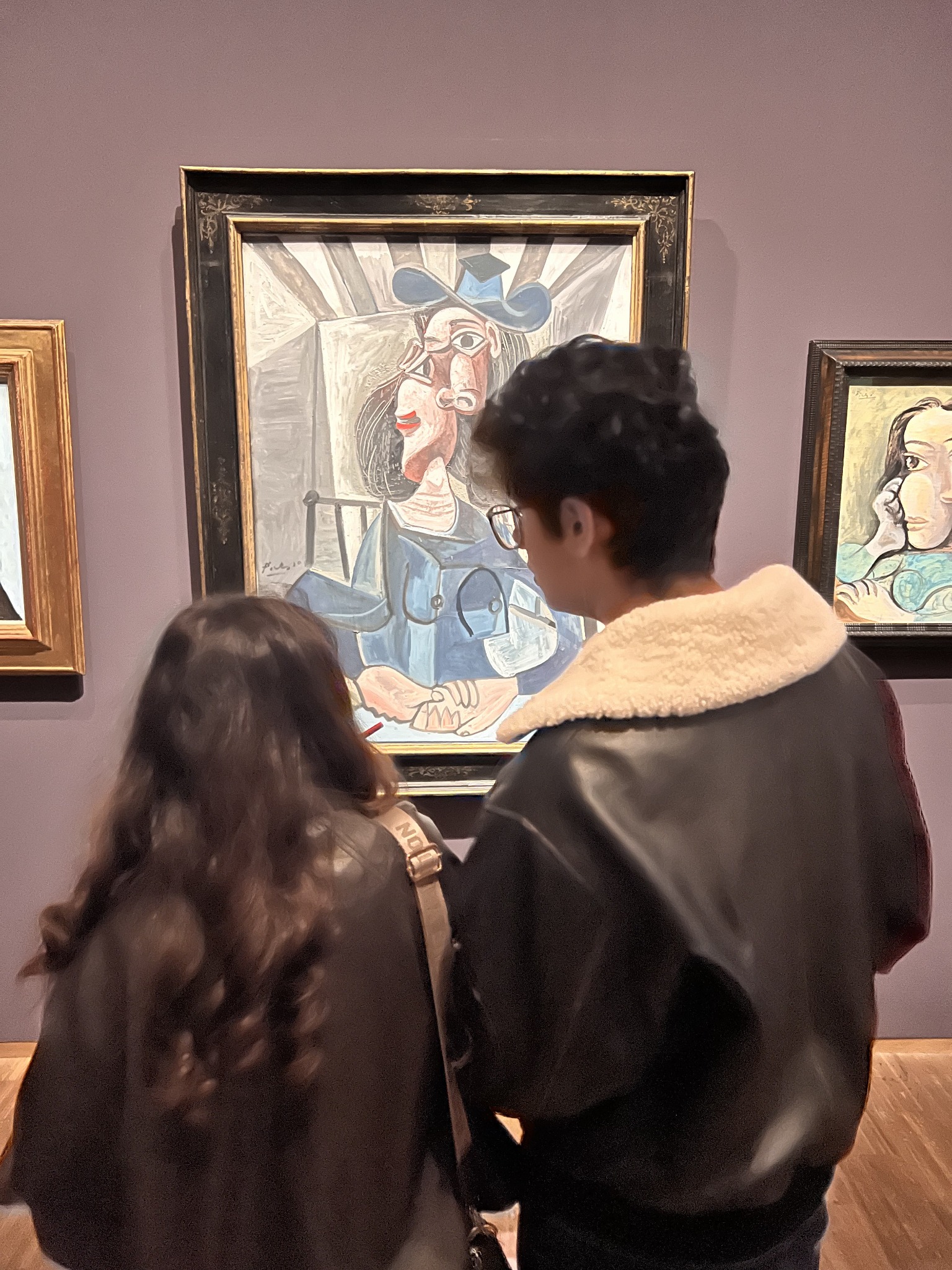 Schloss Krumbach students examining a large Picasso painting during their IB Visual Arts excursion to the Albertina Museum.