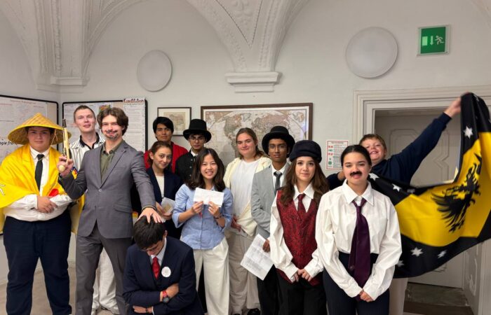 Schloss Krumbach International School students dressed as historical delegates during a World War I diplomacy simulation.